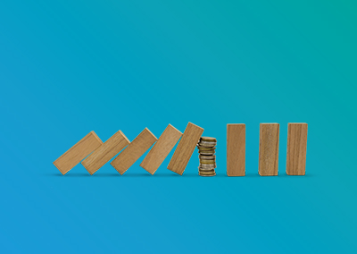 Narrow wooden blocks set up like falling dominos with a stack of coins in the center.